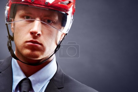 Man in hockey helmet