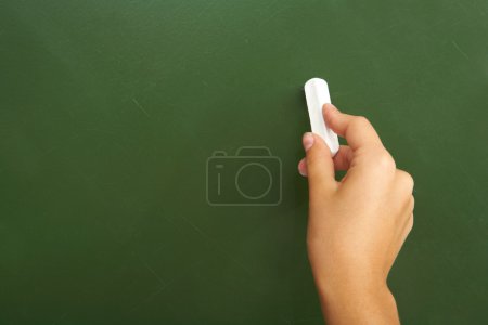 Writing on chalkboard