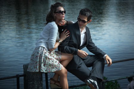 Young couple with sunglasses
